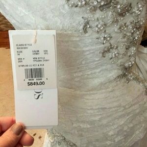 Ivory wedding gown new with tags